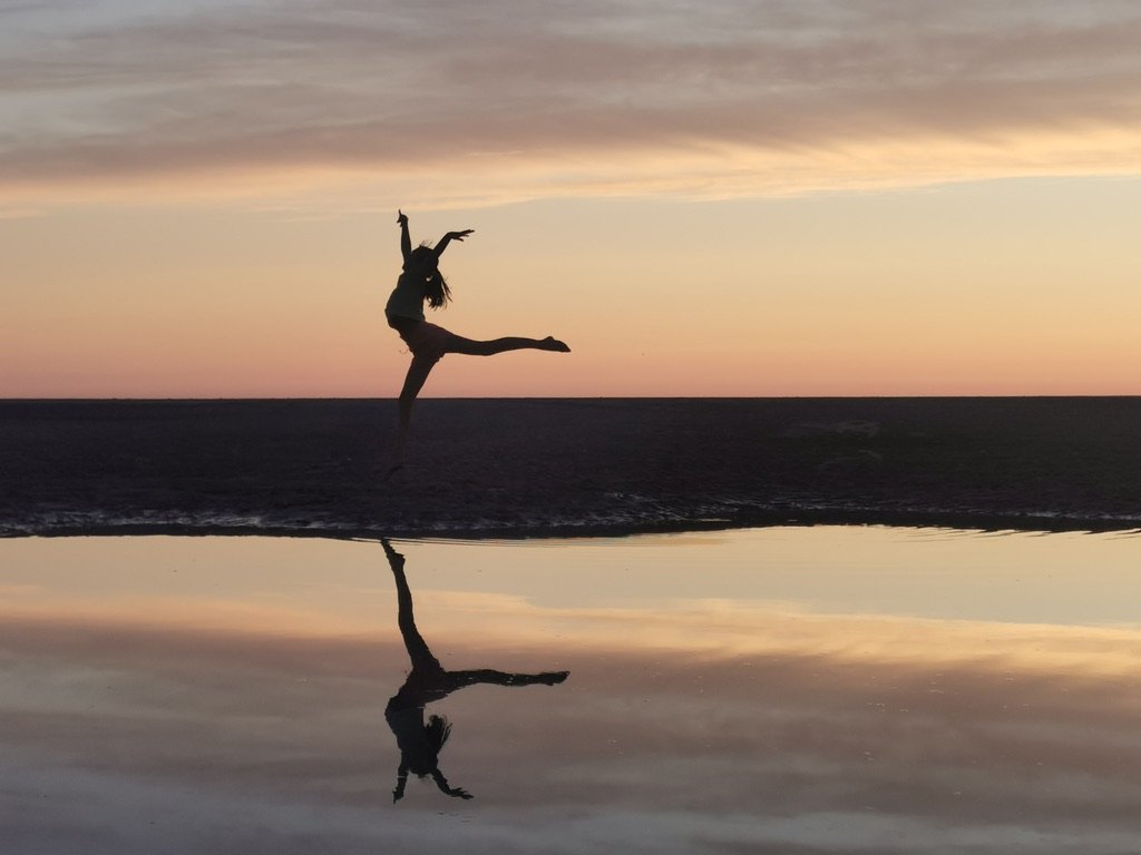What makes us different image - gymnast dancing in a sunset